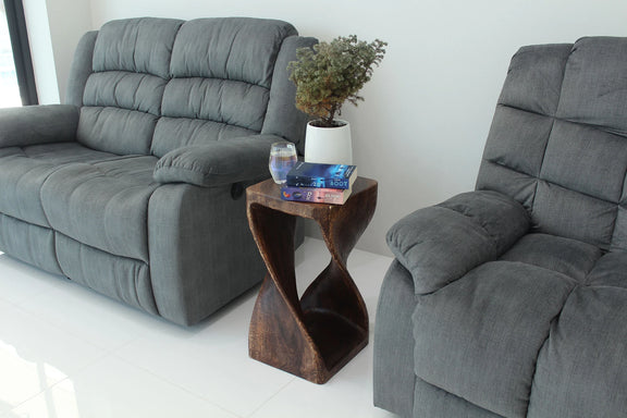 Mocha Original Twist hand-carved wood end table, 12 x 12 x 23 inches, in a furnished room