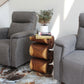 Haussmann Big Wave hand-carved wood end table, Walnut, 12 x 14 x 25 in H, in a room